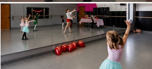 Ballet students practicing at the mirror